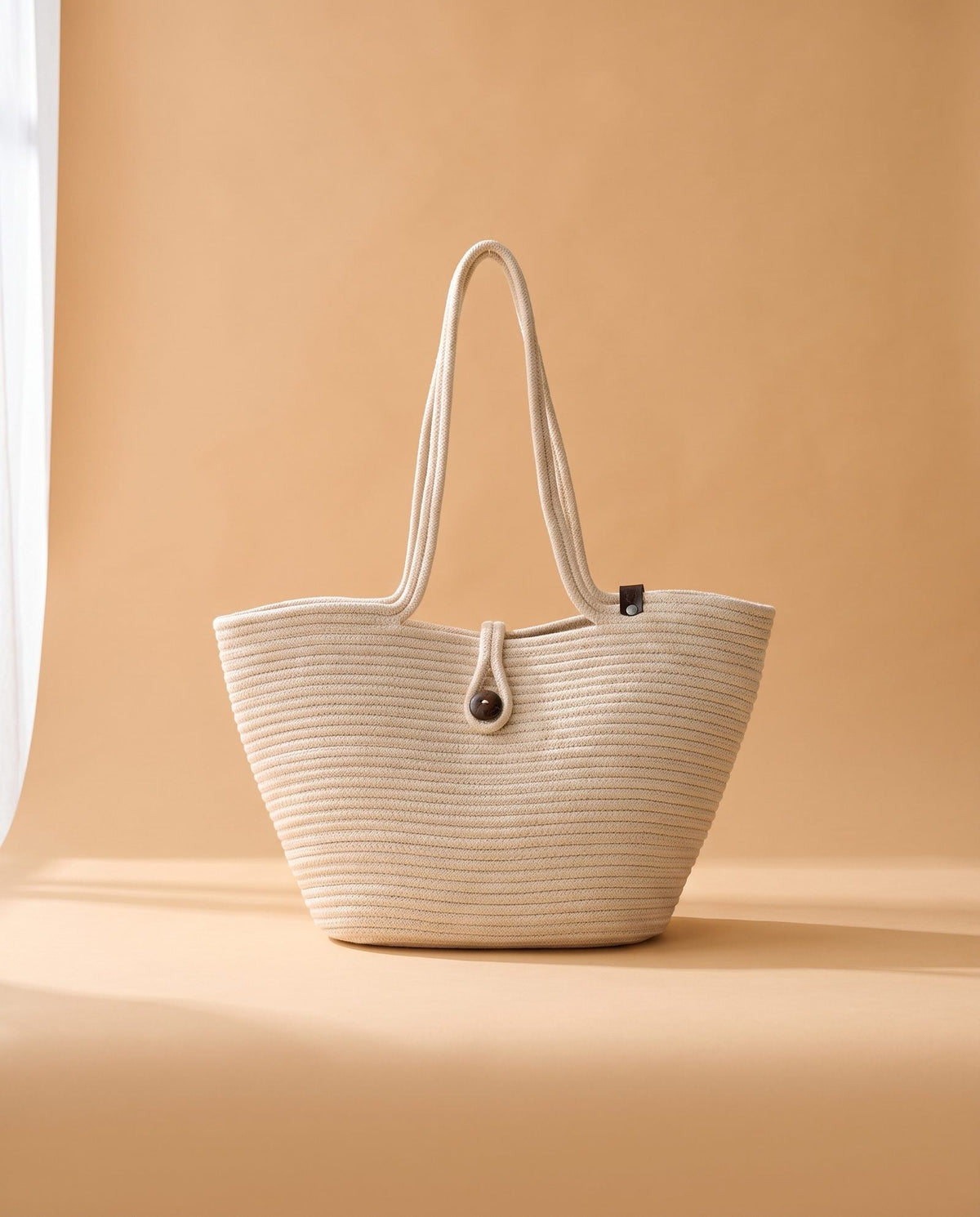 Deneb Buttoned Straw Shoulder Bag in cream, front view with woven straw-effect texture and button closure – women's shoulder bag by Nouva