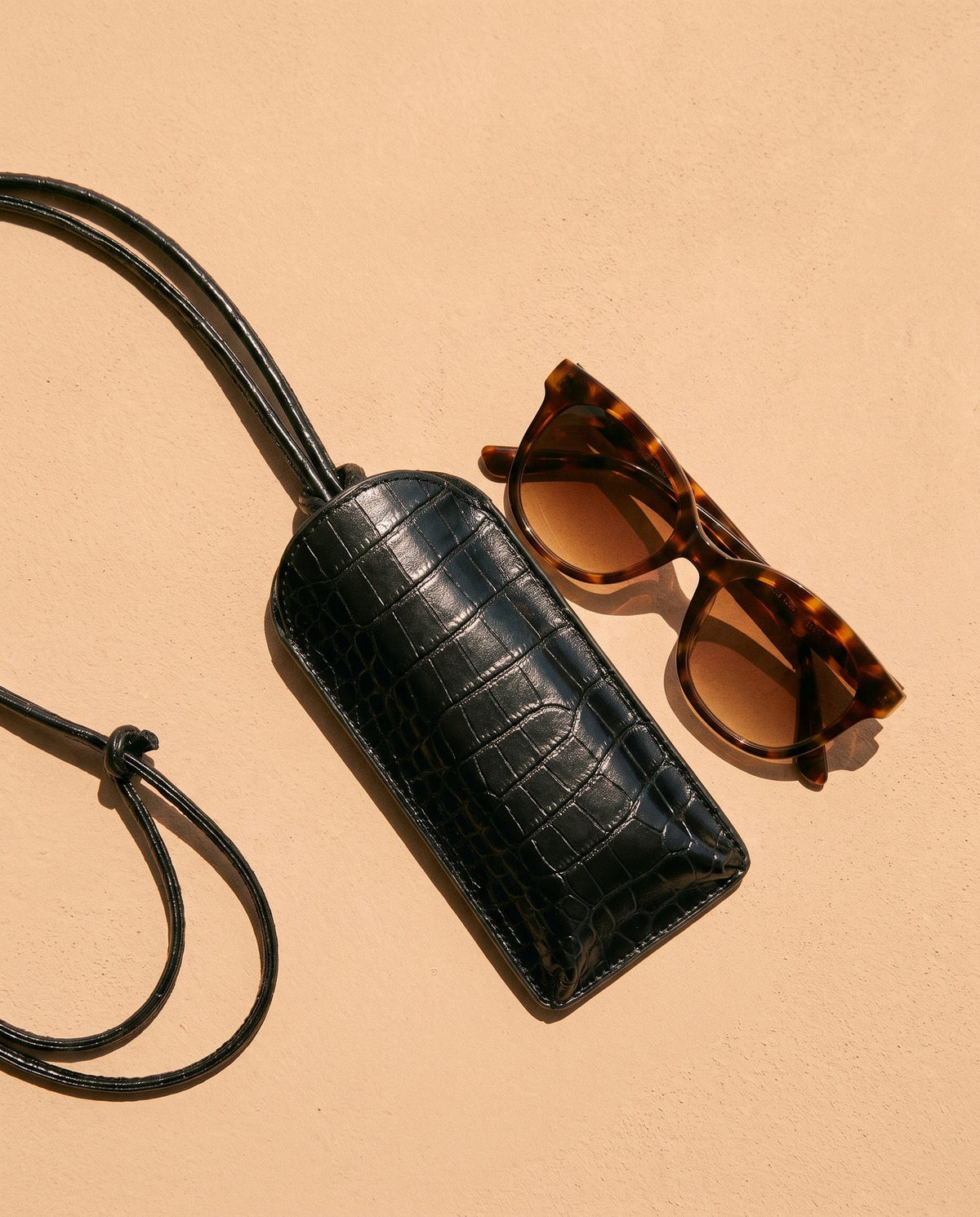 Vitrine Croc-Print Glasses Case in black with sunglasses – women's sunglasses case by Nouva
