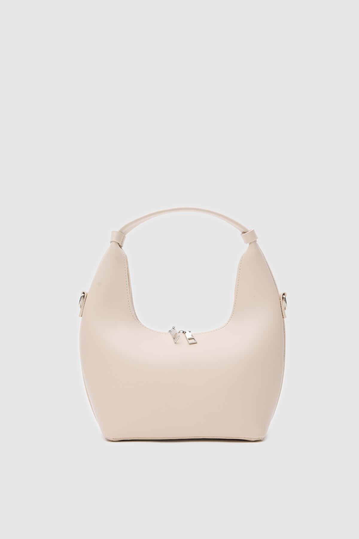 Mizar Crossbody Bucket Bag in cream – women's bucket bag by Nouva