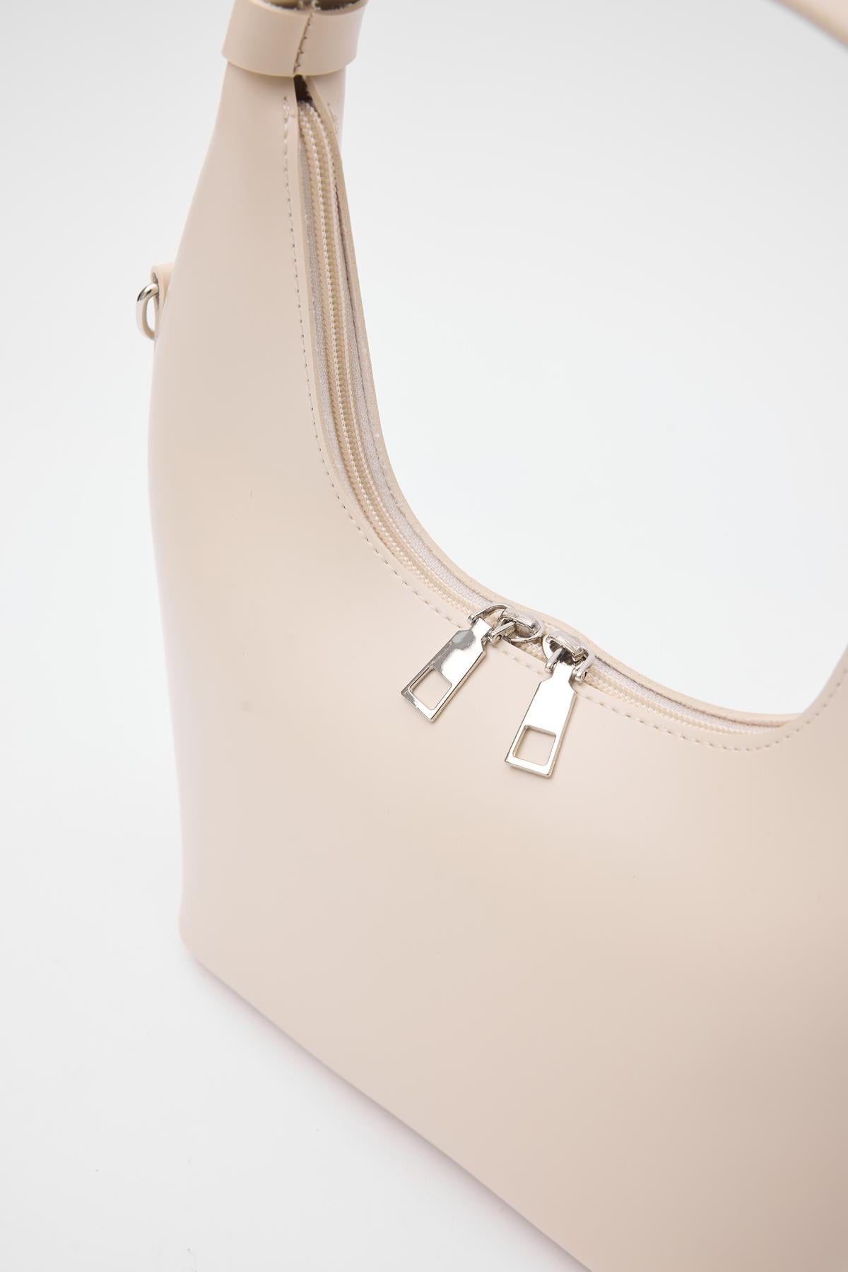 Mizar Crossbody Bucket Bag in cream, view 4 – Nouva