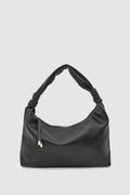 Munira Oval Shoulder Bag in black – women's shoulder bag by Nouva