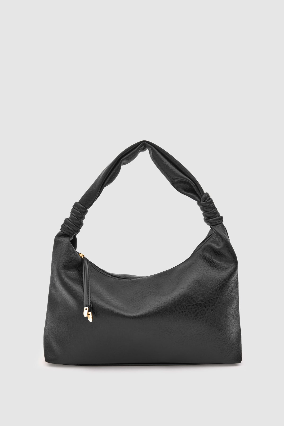 Munira Oval Shoulder Bag in black – women's shoulder bag by Nouva