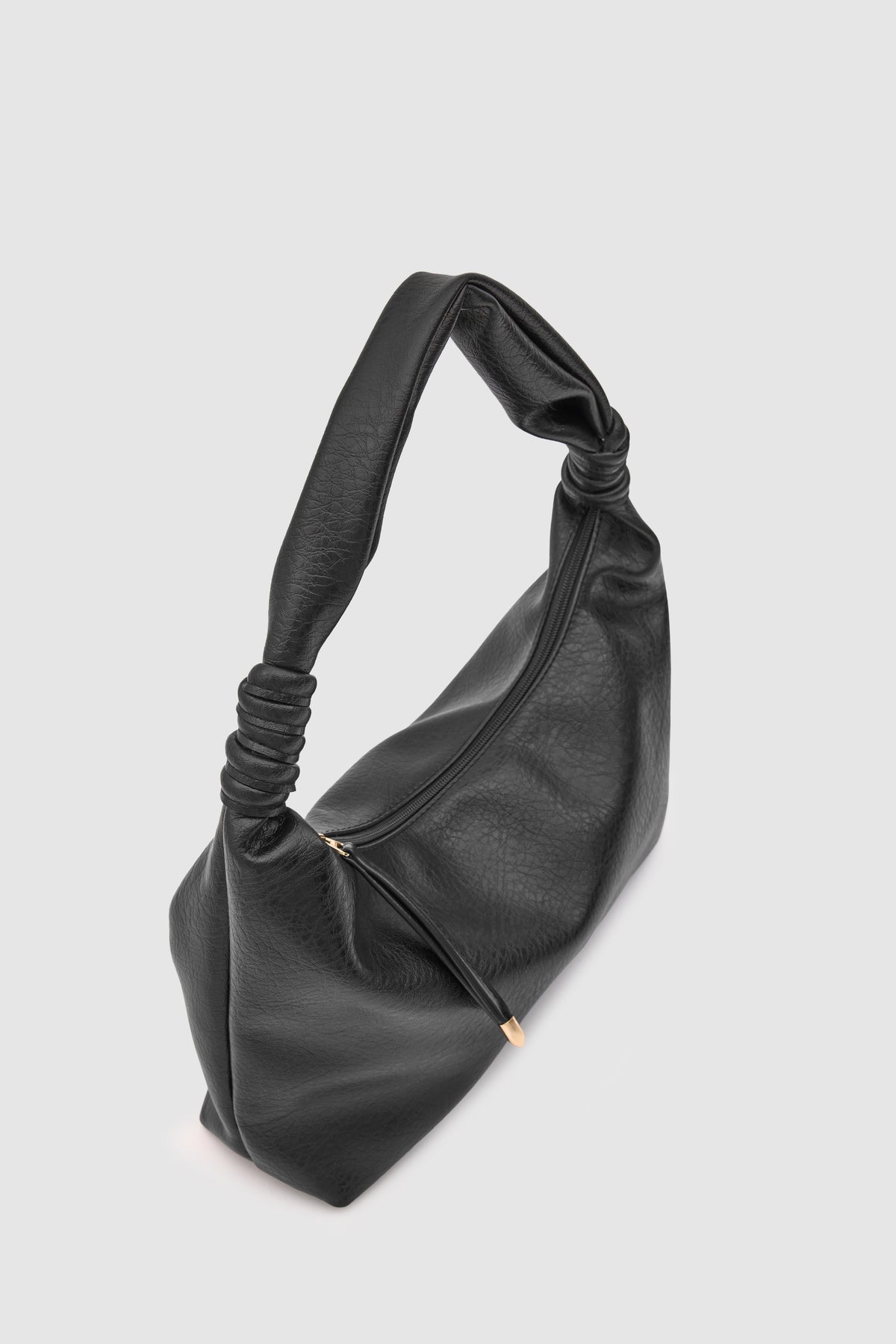 Munira Oval Shoulder Bag in black, view 3 – Nouva