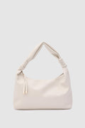 Munira Oval Shoulder Bag in cream – women's shoulder bag by Nouva