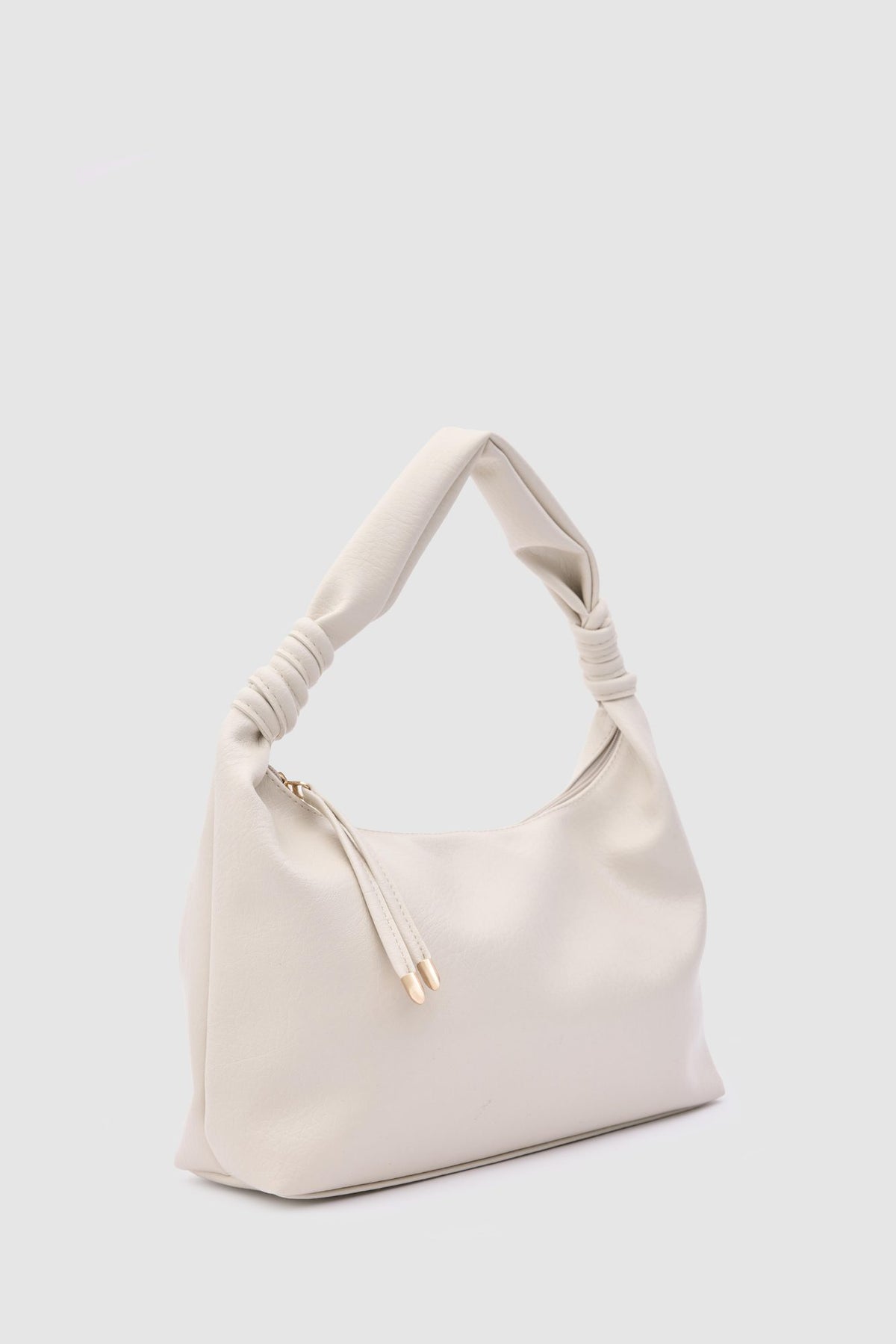 Munira Oval Shoulder Bag in cream, view 2 – Nouva