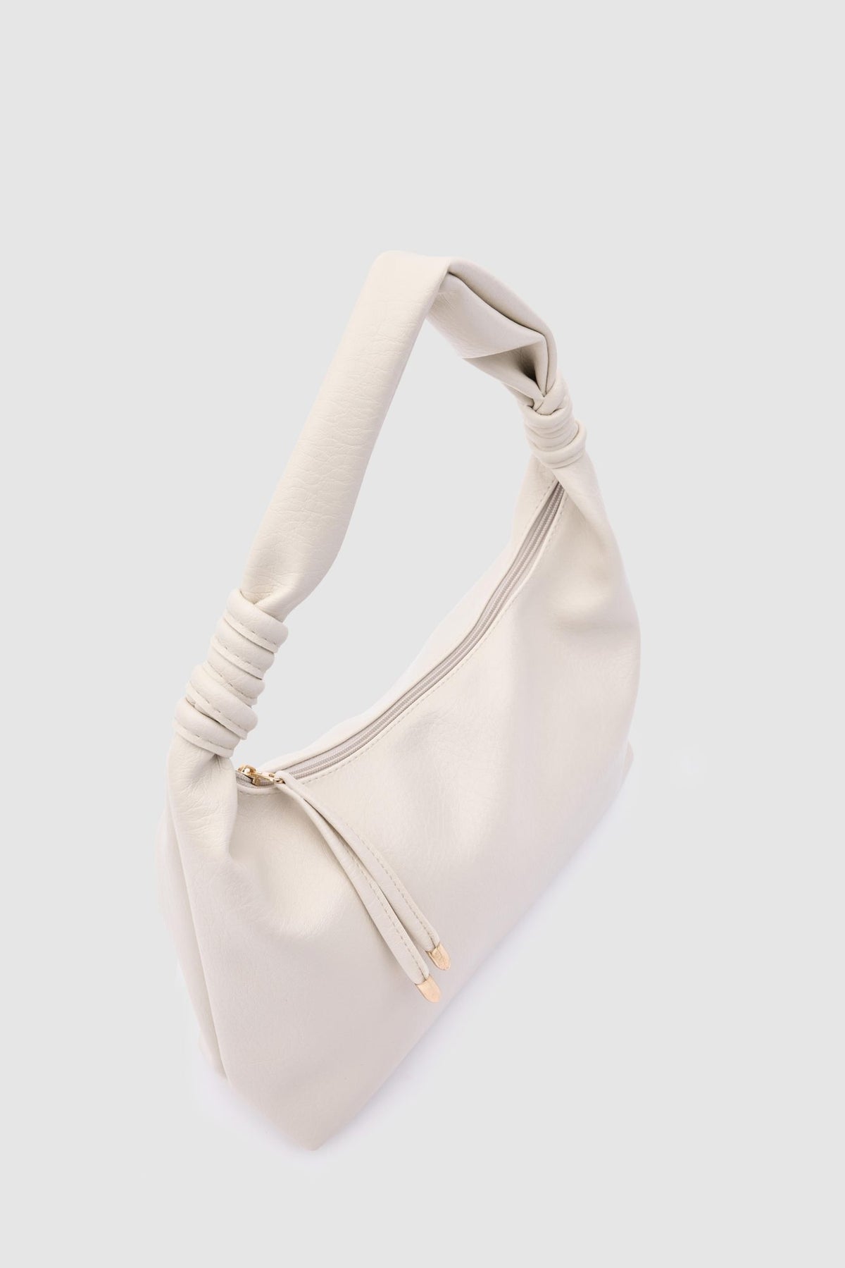 Munira Oval Shoulder Bag in cream, view 3 – Nouva