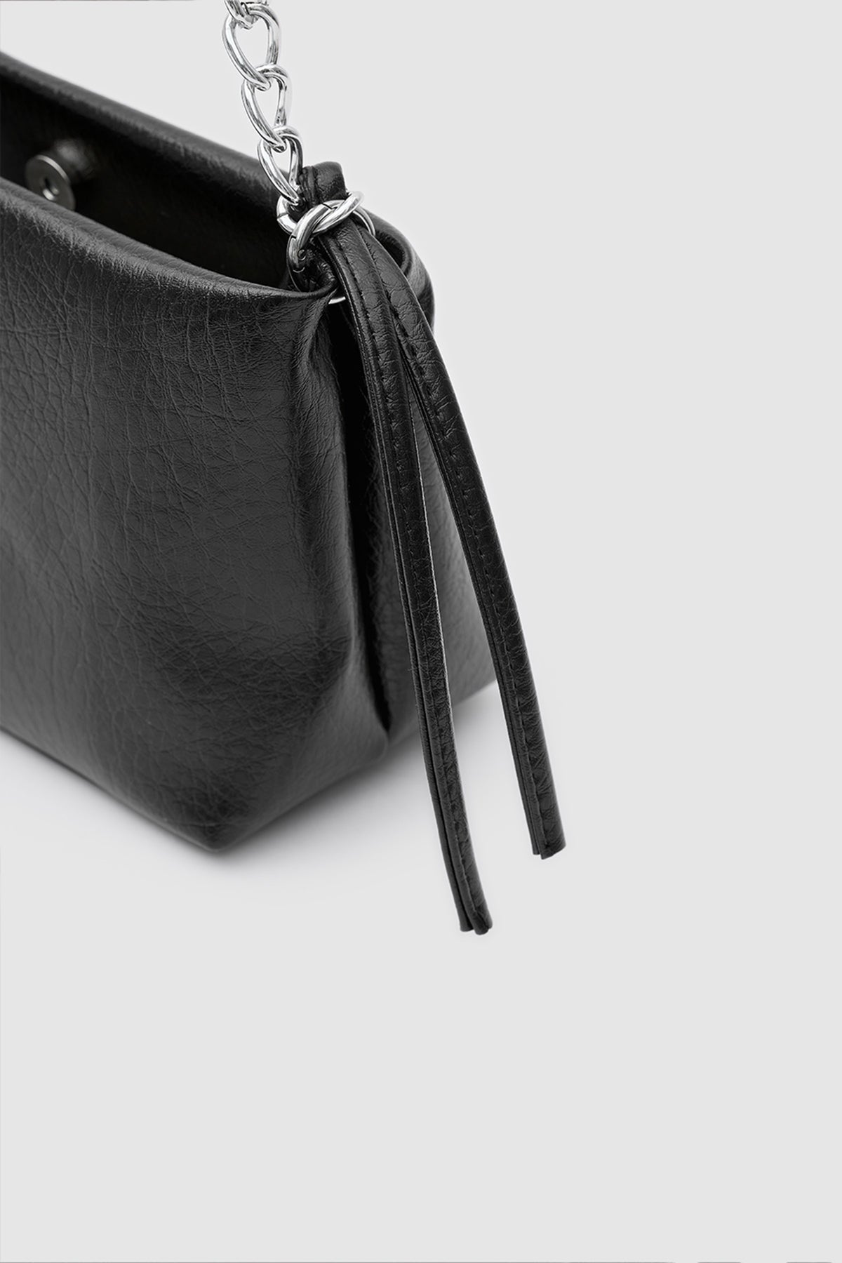 Shira Chain and Tassel Crossbody Bag in black, view 6 – Nouva