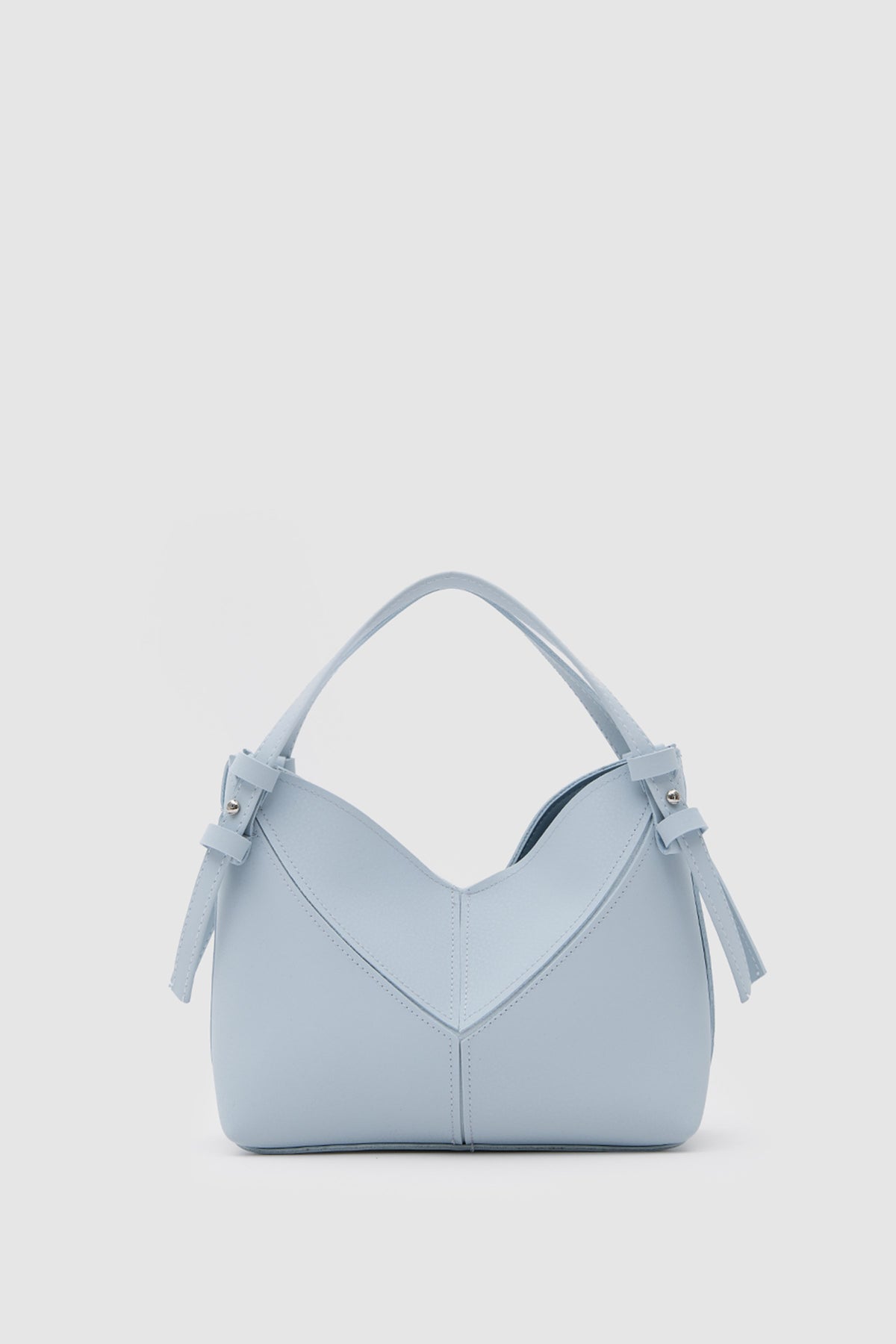 Simak Asymmetric Charm Crossbody Bag in baby blue – women's crossbody bag by Nouva