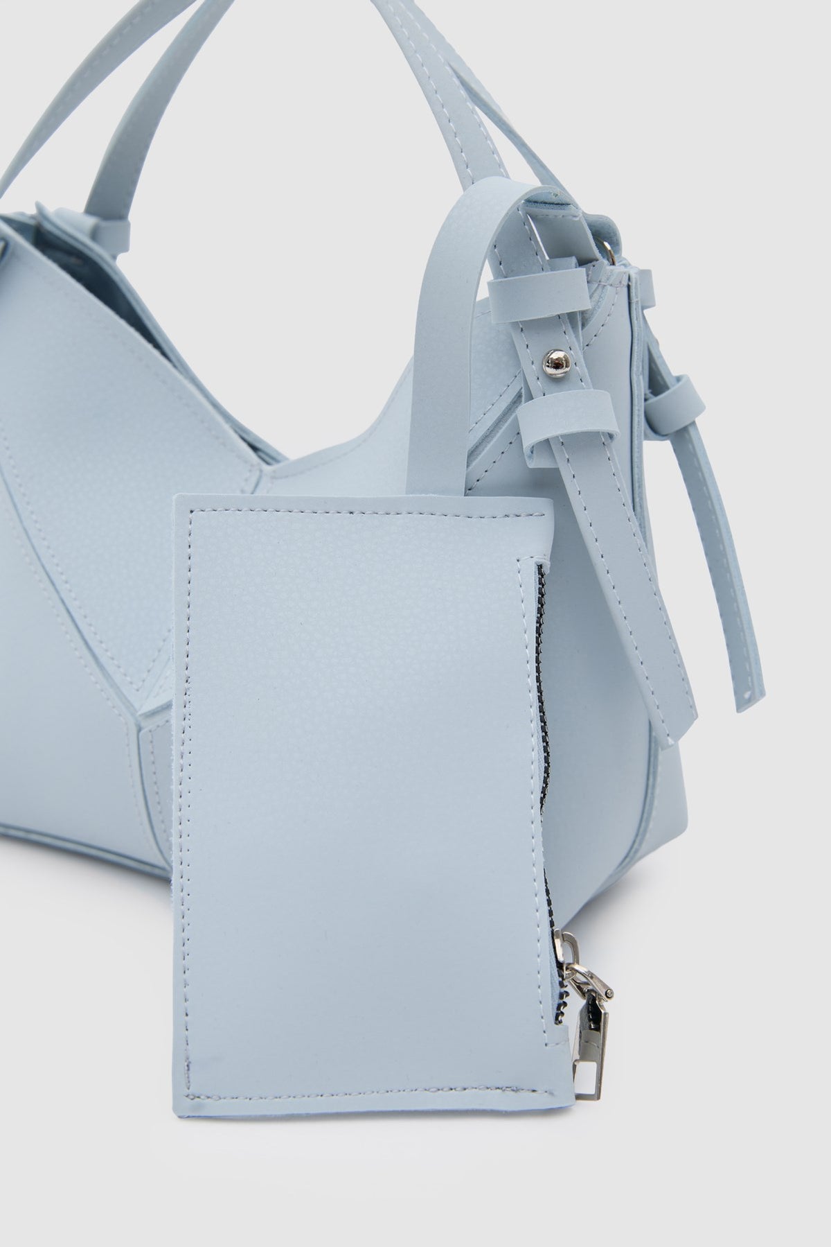 Simak Asymmetric Charm Crossbody Bag in baby blue, view 5 – Nouva