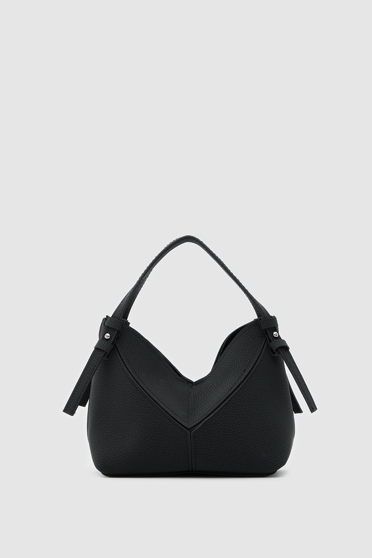 Simak Asymmetric Charm Crossbody Bag in black – women's crossbody bag by Nouva