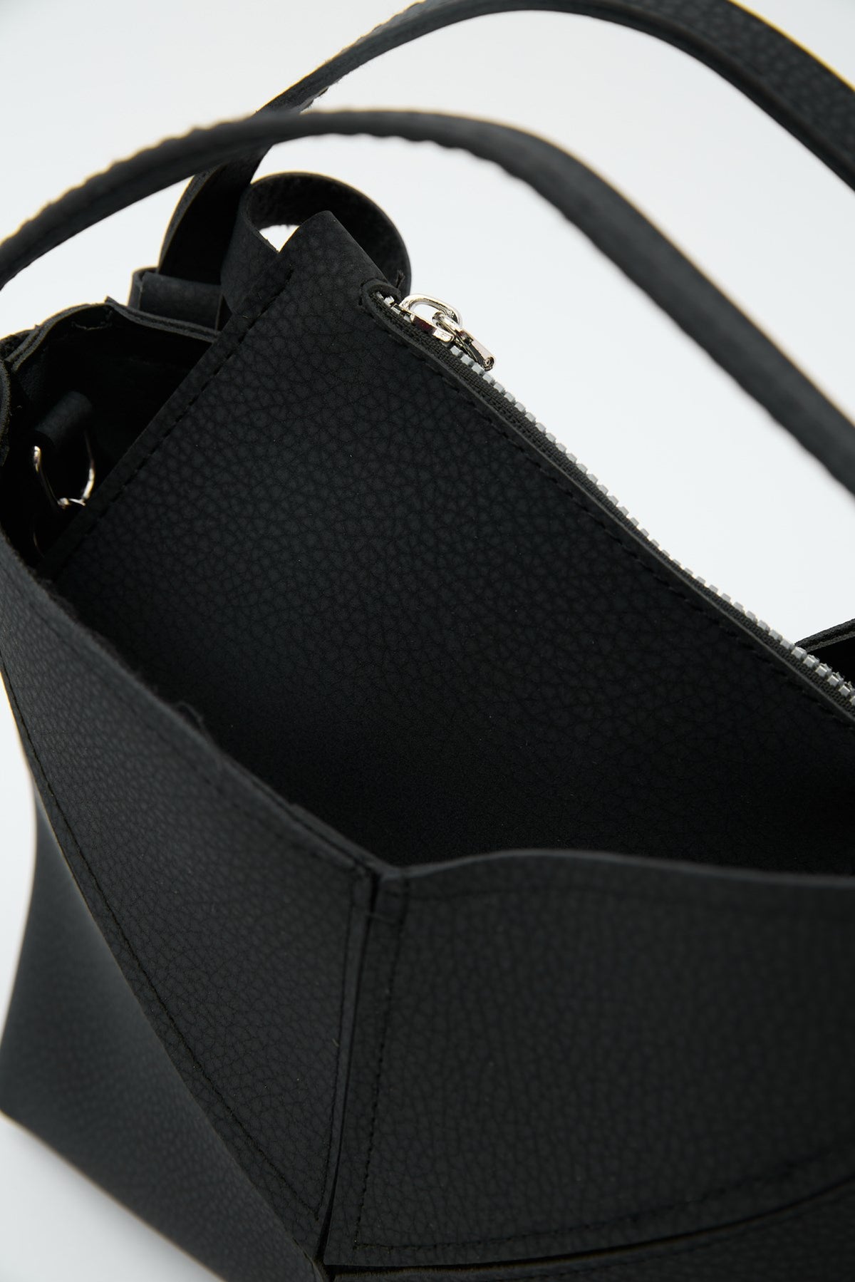 Simak Asymmetric Charm Crossbody Bag in black, view 6 – Nouva