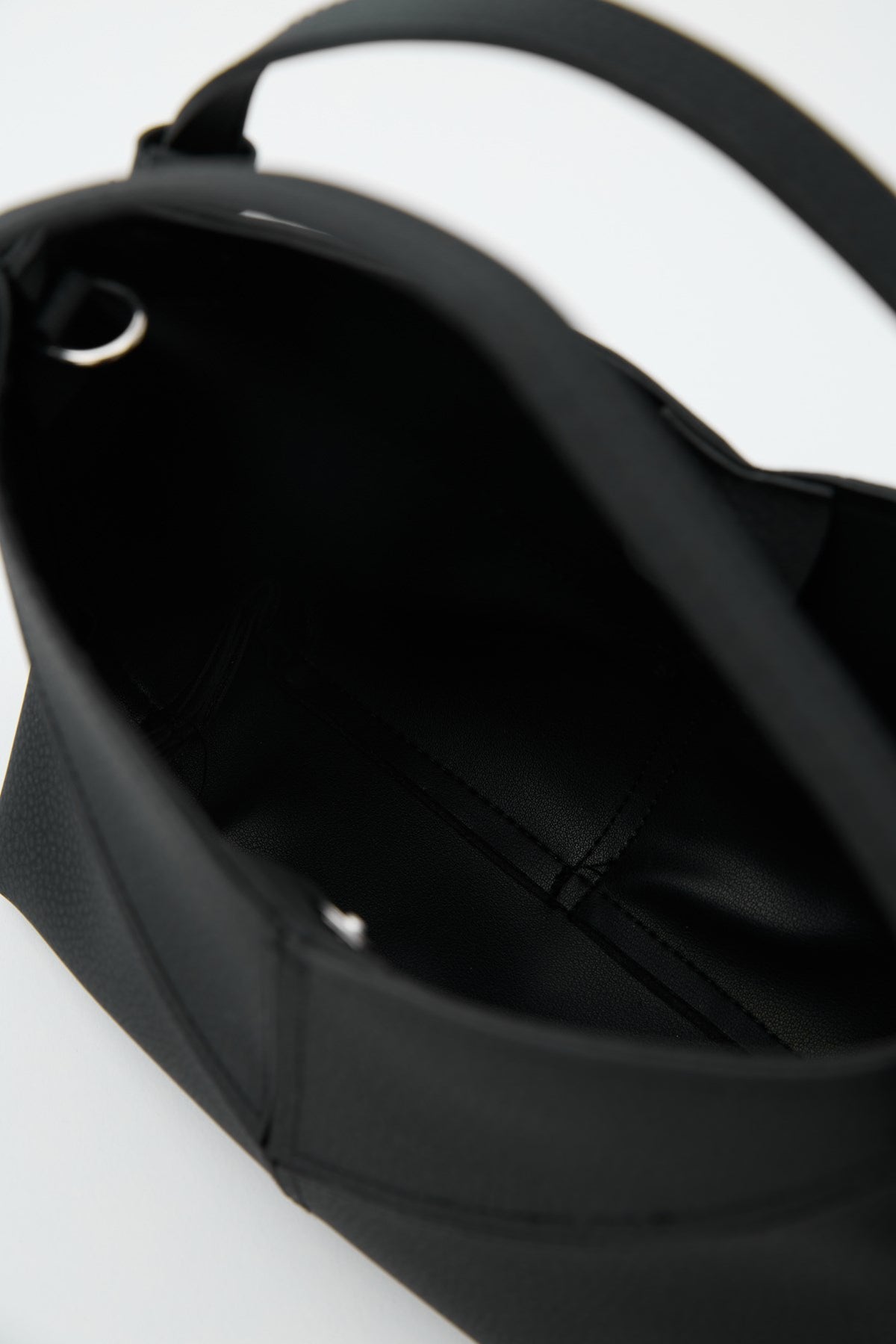 Simak Asymmetric Charm Crossbody Bag in black, view 8 – Nouva