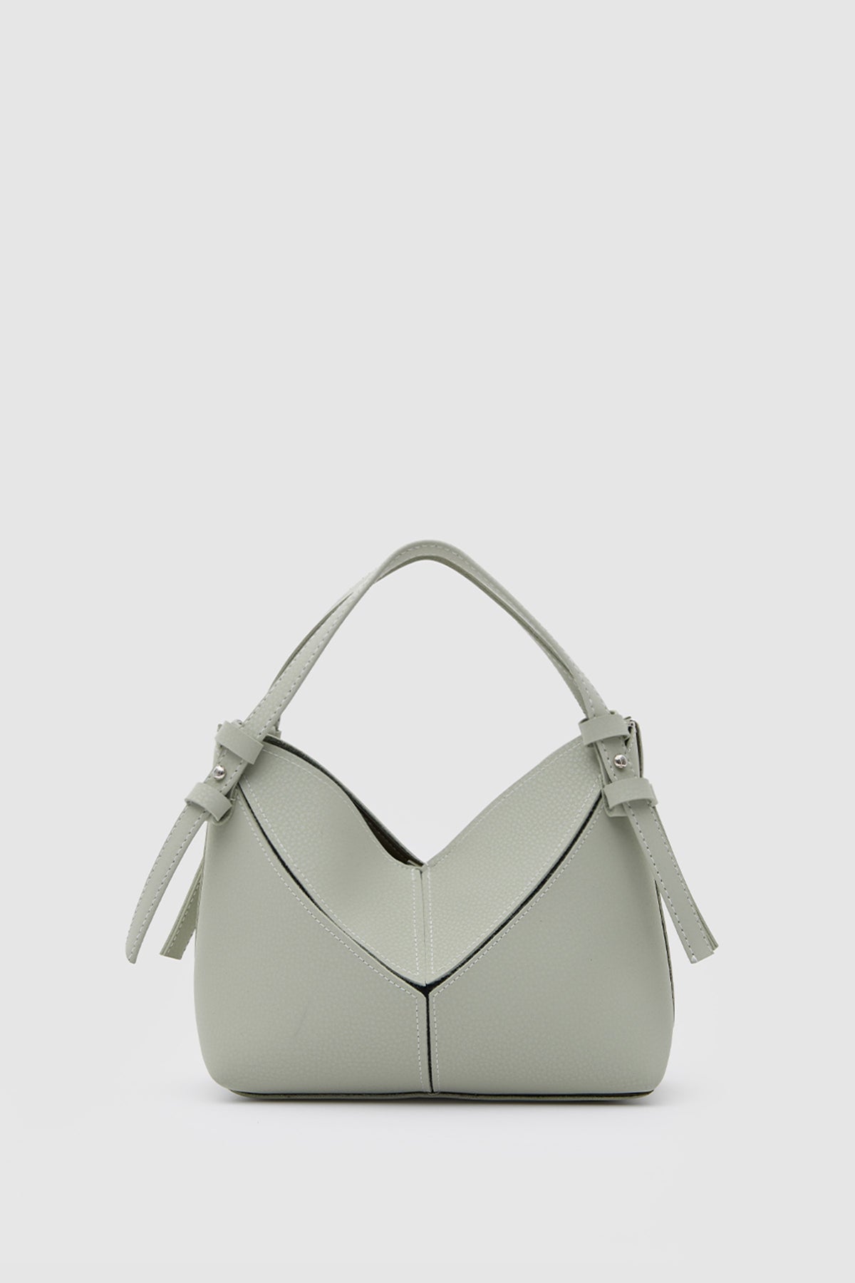 Simak Asymmetric Charm Crossbody Bag in mint – women's crossbody bag by Nouva