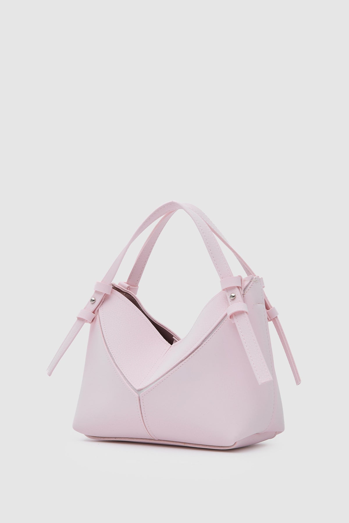 Simak Asymmetric Charm Crossbody Bag in sakura pink, view 2 – Nouva
